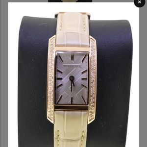 Burberry rose gold & diamond leather strap watch.